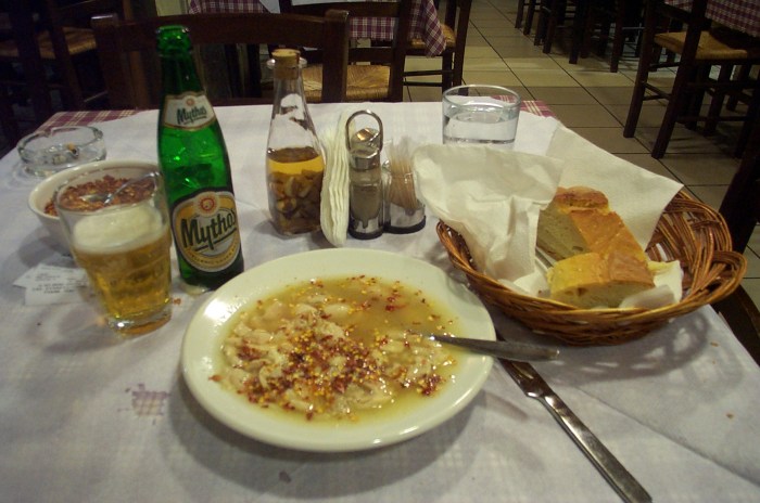 Greek patsas, here served with dried chili peppers and a Greek beer Mythos.