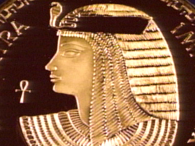 Portrait of Cleopatra in the classic Egyptian style from the side.