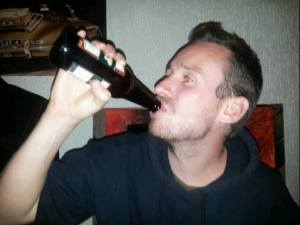 Micky drinking his first bottle of homebrew beer.