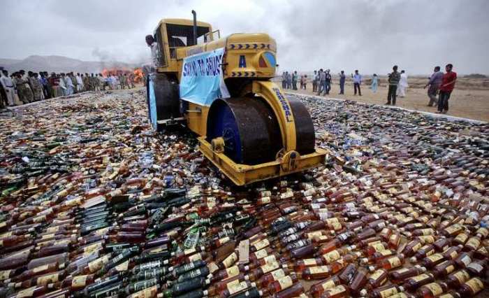 Many fine bottles of alcohol are destroyed in Pakistan after death threats by the Taliban.