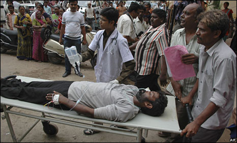 Man is hospitalized after drinking moonshine in Ahmedabad in 2009. At this occasion in the province Gujarat, that prohibits alcohol, 136 people got killed.