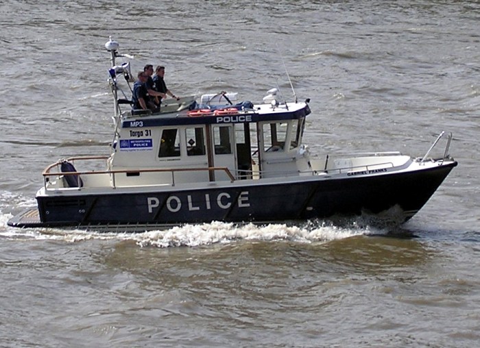 Who doesn't  dream about taking a police patrol boat for a drunken joy ride?
