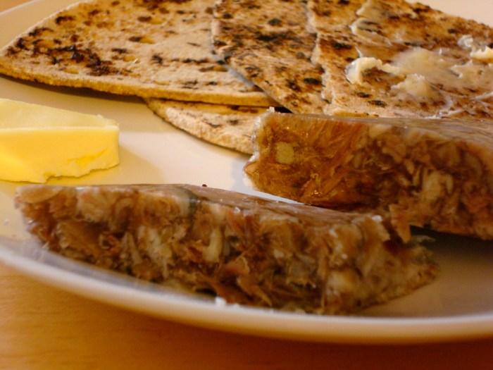The traditional Icelandic hangover cure sviðasulta, served with  Flatbrauð (flat bread) and butter.