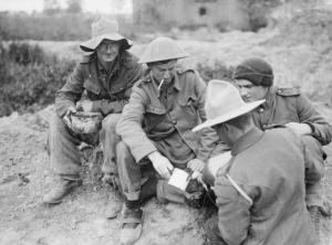 Soldiers from New Zealand receive their daily rum ration in World War I.