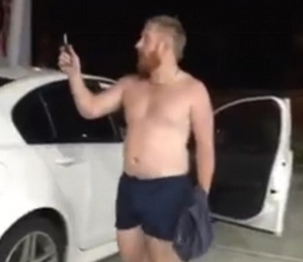 Australia,s new national hero James Ross-Munroe takes the keys out of the robbers' getaway car.