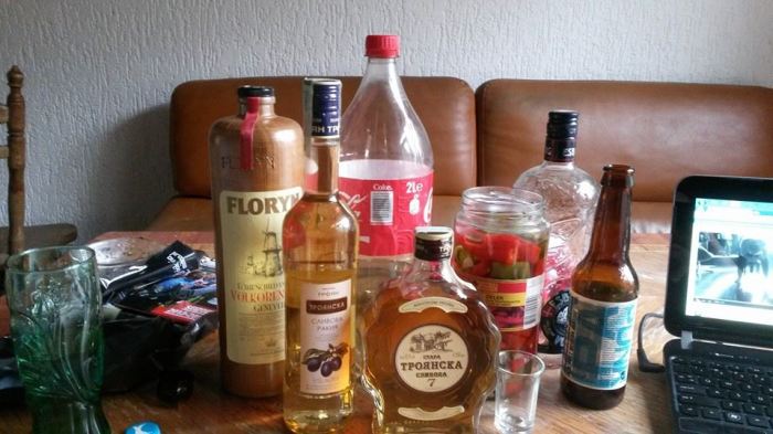 Any kind of booze will do for Rock-Paper-Three Shots. Everything else you need is a dice.